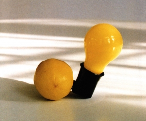 Joseph Beuys - Capri-Batterie, 1985, light bulb with plug socket, in wooden box; lemon