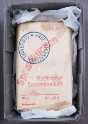 Joseph Beuys - Wirtschaftswert Speisekuchen, 1977, packaged instant gravy in cake form with handwritten addition, stamped