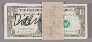 Joseph Beuys - Dollarnoten, 1978, two banknotes, one inscribed by Beuys, the other printed with text by Klaus Staeck