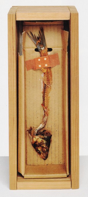 Joseph Beuys - Freitagsobjekt &quot;1a gebratene Fischgräte (Hering)&quot; (Friday Object “1st-Class Fried Fish Bones (Herring)”), 1970, fishbone and greaseproof paper, inscribed and stamped, in glass-fronted wooden box