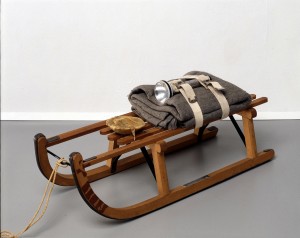 Joseph Beuys - Schlitten (Sled), 1969, wooden sled, felt, belts, flashlight, fat and rope; sled stamped with oil paint (Browncross)