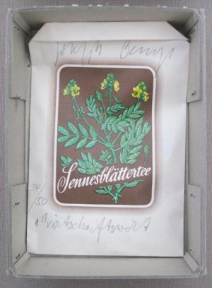 Joseph Beuys - Wirtschaftswert Brusttee, 1977, tea package with handwritten addition in cardboard box