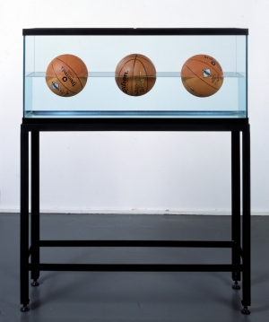 Jeff Koons - Three Ball 50/50 Tank (Two Spalding Dr. J Silver Series, Wilson Supershot), 1985, glass, steel, distilled water and three basketballs