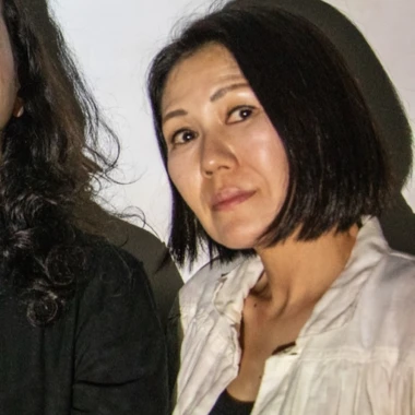 Satomi Matsuzaki wearing a light blouse