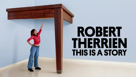 A young woman reaching for a sculpture of an oversized dining table that she can't quite reach next to the exhibition title "Robert Therrien: This is a Story"