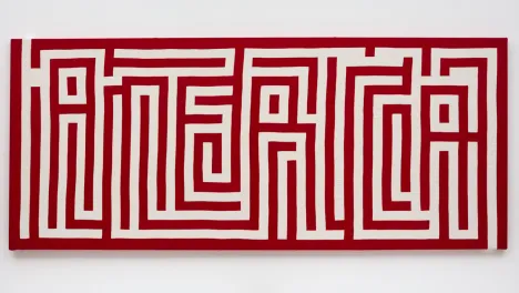 Bold red lines appear as a maze that forms the word "America"
