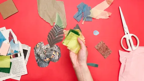 still of woman's hands making an art activity from the Mark Bradford-inspired family art workshop