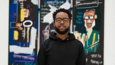 Terrace Martin in front of Jean-Michel Basquiat's Horn Players at The Broad