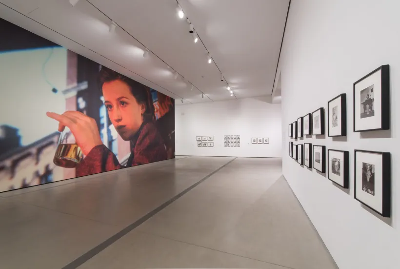 Cindy Sherman: Imitation of Life Installation Photo with Mural and Bus Riders