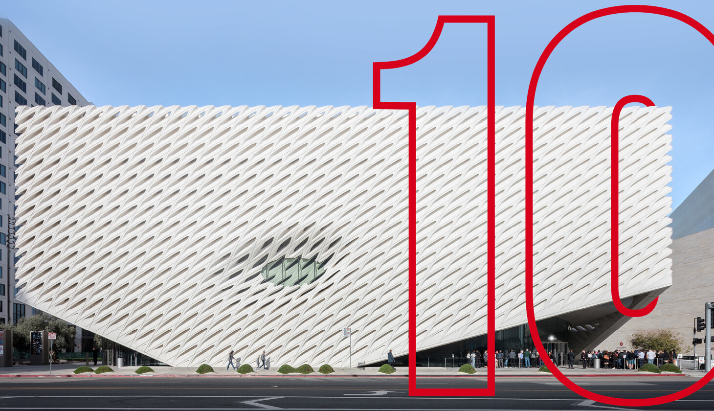 Broad exterior during daytime with a 10 graphic overlayed and wrapping around the building