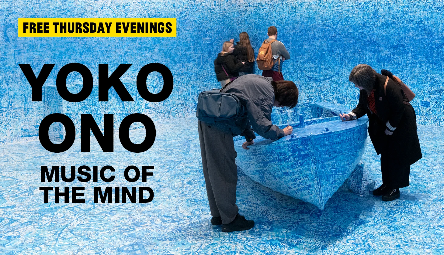 Visitors drawing with blue market on a boat that was once white in Yoko Ono: Music of the Mind